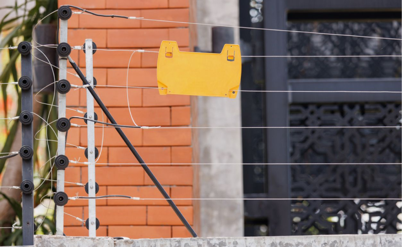 Electric security fencing installed along a perimeter