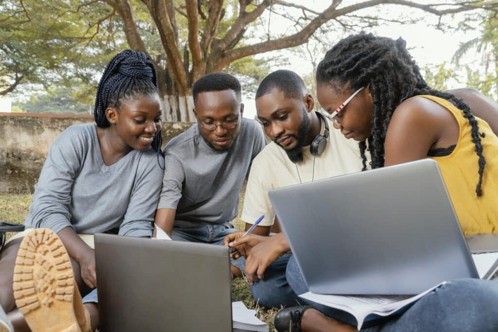 A group of aspiring NYSC student setting up their portable security alarms.
